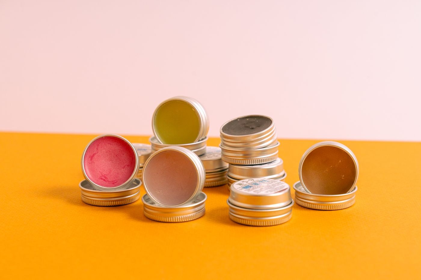 Lip balms in small metal containers