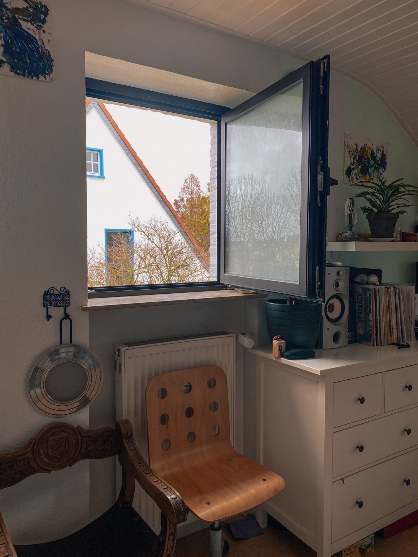An open window in a bright room
