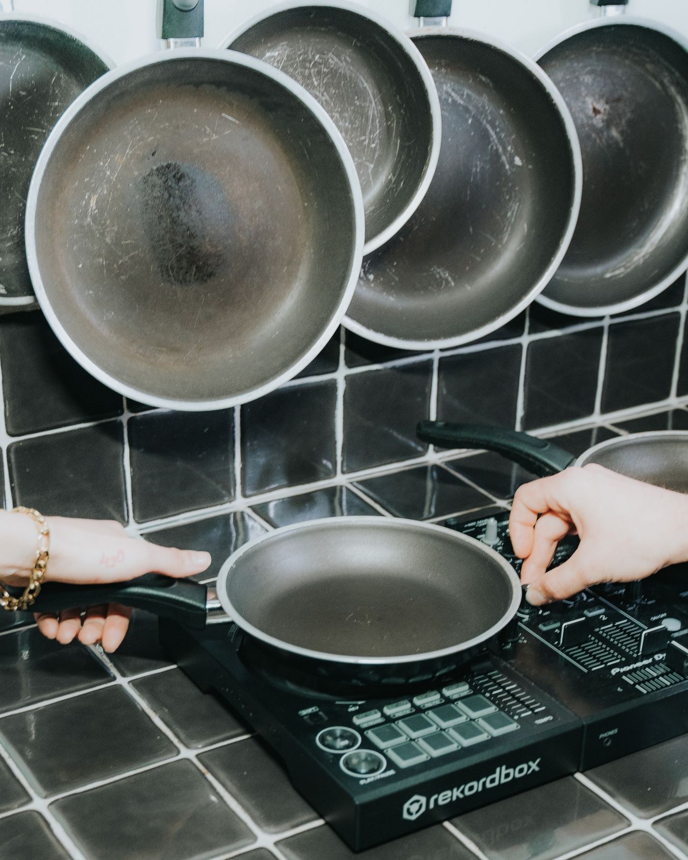 A frying pan on an electric stove