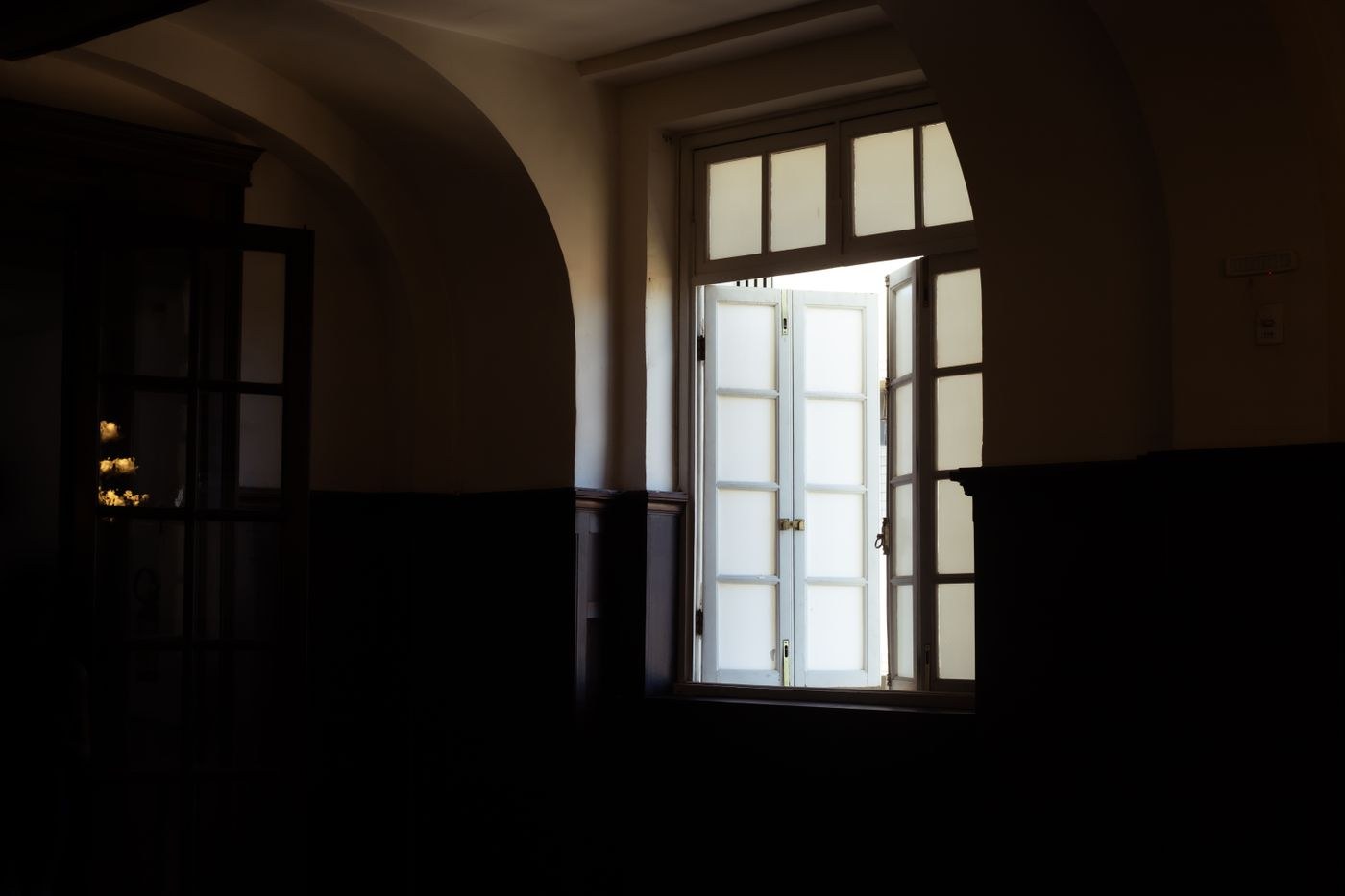 An open window brings outdoor air into a room
