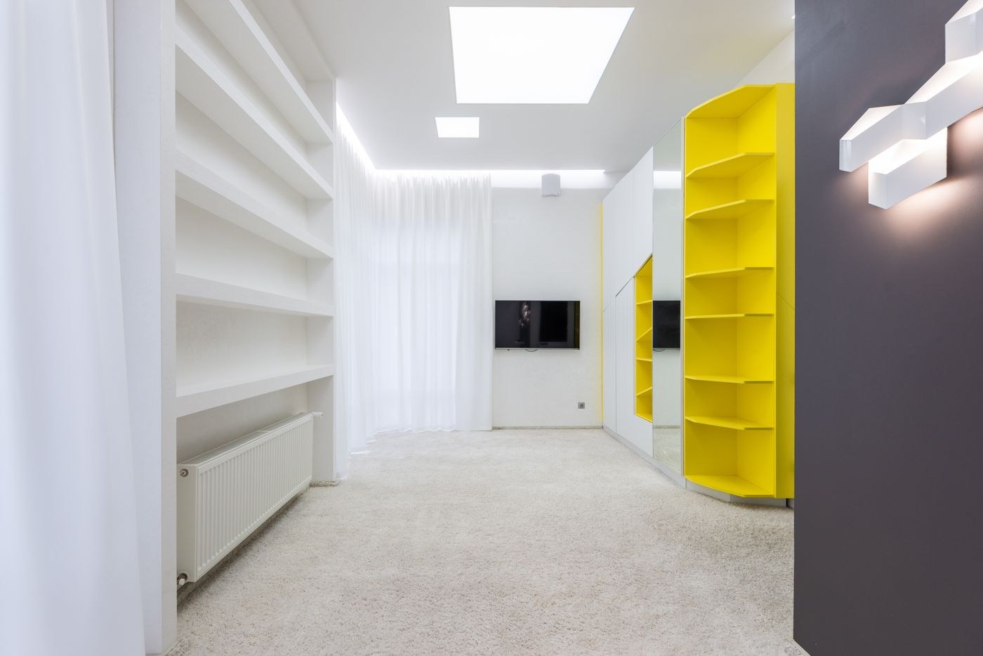 New furniture in a bright room with windows